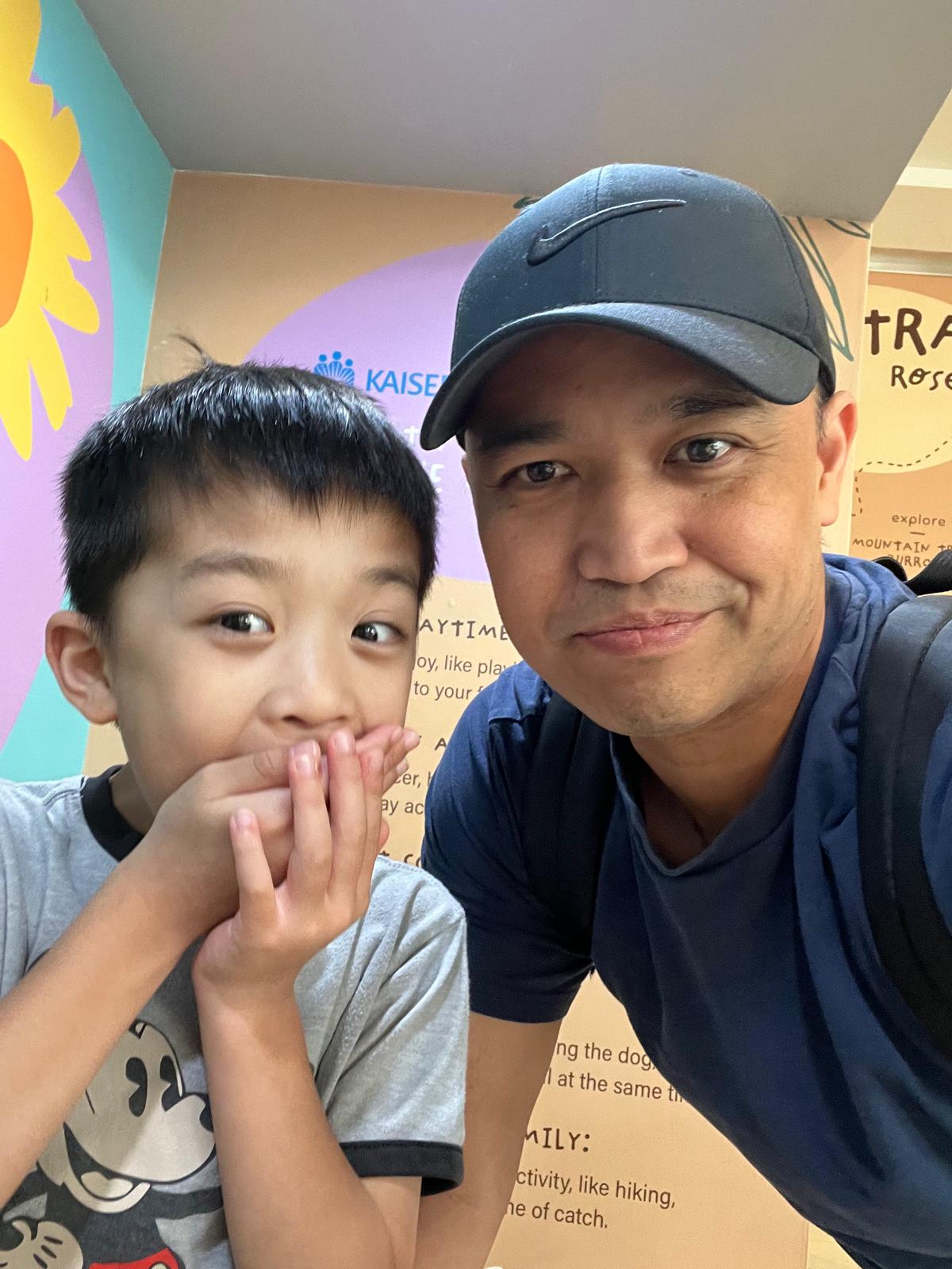 George and his son at the doctor's office